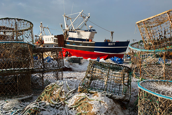 rx77-amongst-the-lobster-pots-hastings-uk-photo-archive