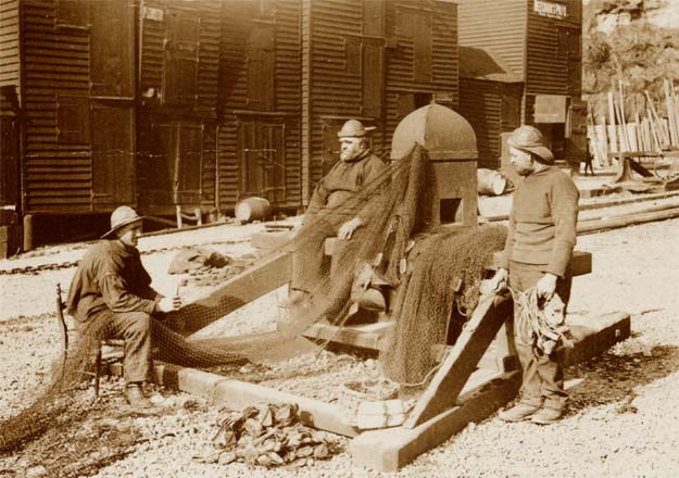 Fishermen Mending Nets